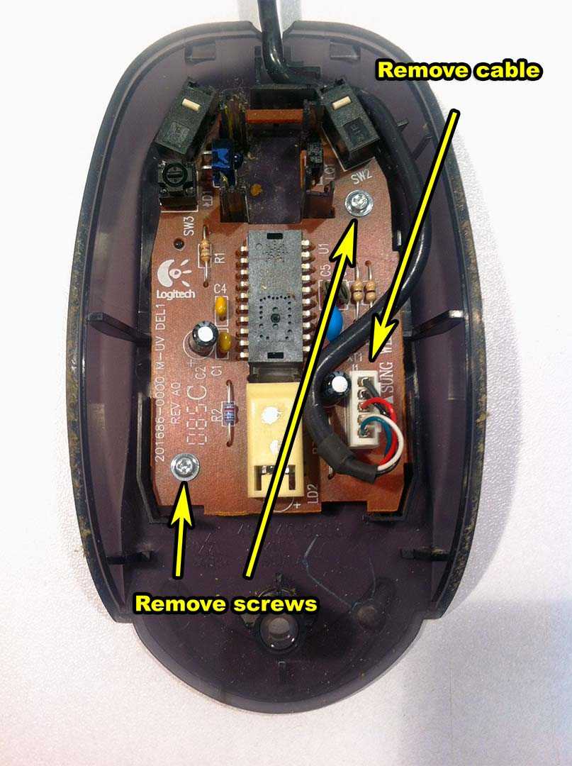 Dell mouse disassembly - 001 remove cables and screws.